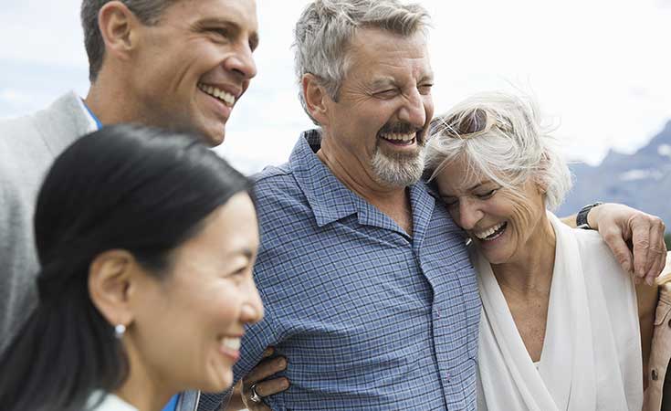 Two couples sharing a funny moment